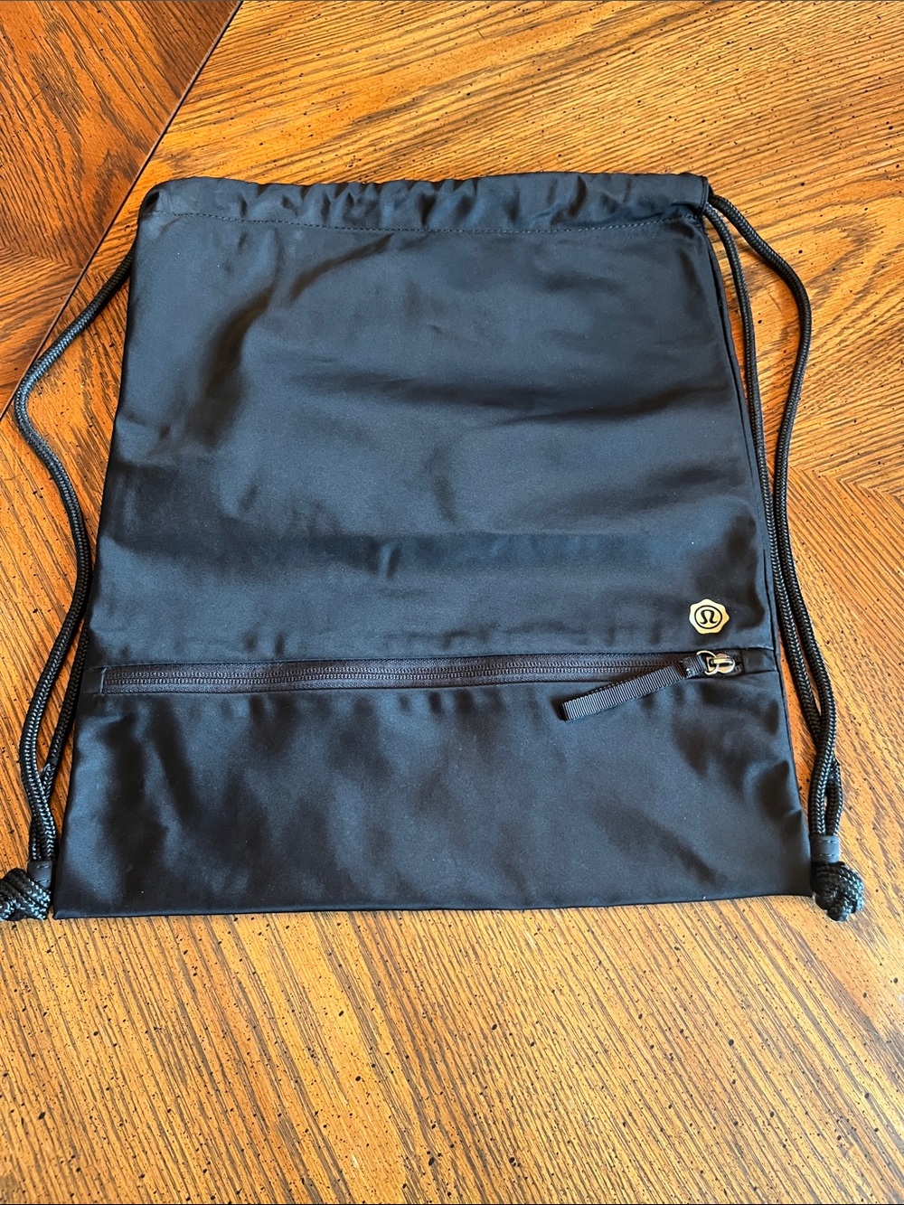 Seawheeze Black Drawstring Backpack with Front Zip Pocket